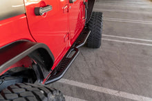 Load image into Gallery viewer, DV8 Offroad 07-18 Jeep Wrangler JK (4 Door Only) OE Plus Side Steps