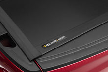 Load image into Gallery viewer, UnderCover 16-20 Nissan Navara 5ft Ultra Flex Bed Cover - Matte Black Finish