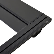 Load image into Gallery viewer, Westin 24-26 Toyota Tacoma 5ft Bed Manual Retractable Tonneau Cover - Black