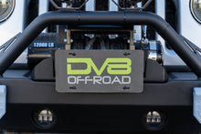 Load image into Gallery viewer, DV8 Offroad Fairlead Mounted Flip-Up License Plate Bracket