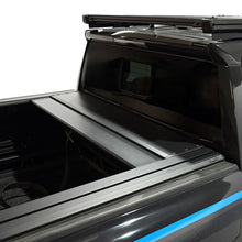 Load image into Gallery viewer, Westin 24-26 Toyota Tacoma 5ft Bed Manual Retractable Tonneau Cover - Black