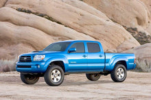 Load image into Gallery viewer, Fabtech 05-14 Toyota Tacoma 2WD/4WD 3in UCA &amp; Dlss 2.5 C/O Sys w/Dlss Resi Rr Shks