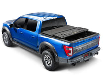 Load image into Gallery viewer, Extang 17-23 Nissan Titan w/Rail Sys. (5ft. 7in. Bed) Solid Fold ALX