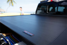 Load image into Gallery viewer, Roll-N-Lock 09-14 Ford F-150 67in E-Series Retractable Tonneau Cover