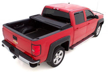 Load image into Gallery viewer, Lund 07-17 Toyota Tundra (6.5ft. Bed) Genesis Elite Tri-Fold Tonneau Cover - Black