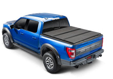 Load image into Gallery viewer, Extang 16-23 Nissan Titan XD w/Rail Sys. (6ft. 7in. Bed) Solid Fold ALX