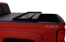 Load image into Gallery viewer, Lund 07-13 Toyota Tundra Fleetside (6.5ft. Bed) Hard Fold Tonneau Cover - Black