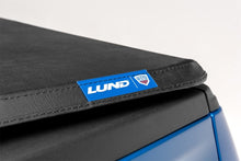 Load image into Gallery viewer, Lund 99-17 Ford F-250 Super Duty (6.5ft. Bed) Genesis Tri-Fold Tonneau Cover - Black