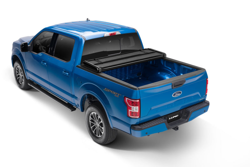 Lund 04-08 Ford F-150 Styleside (5.5ft. Bed) Hard Fold Tonneau Cover - Black