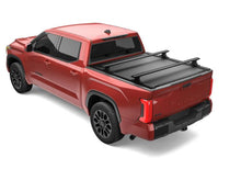 Load image into Gallery viewer, Retrax 2022+ Toyota Tundra (5.7ft Bed w/ Deck Rail System) RetraxONE XR Bed Cover