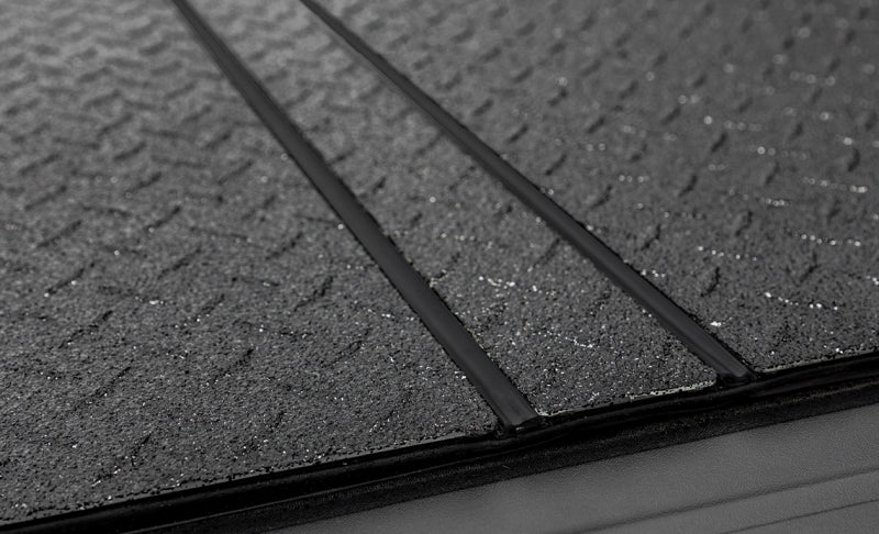 Access LOMAX Tri-Fold Cover 07-21 Toyota Tundra - 5ft 6in Bed (w/ Deck Rail) -  Black Diamond