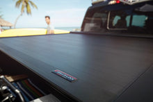 Load image into Gallery viewer, Roll-N-Lock 17-19 Ford F-250/F-350 Super Duty 80-3/8in E-Series Retractable Tonneau Cover