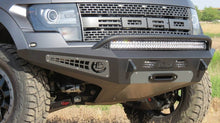 Load image into Gallery viewer, Addictive Desert Designs 10-14 Ford F-150 Raptor HoneyBadger Front Bumper w/ Winch Mount