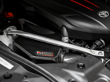 Load image into Gallery viewer, AWE Tuning 2020+ Toyota GR Supra S-FLO Carbon Intake Lid