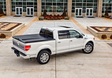 Load image into Gallery viewer, UnderCover 09-14 Ford F-150 5.5ft Elite Bed Cover - Black Textured