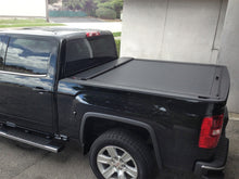 Load image into Gallery viewer, Roll-N-Lock 14-18 Chevy Silverado/Sierra 1500 XSB 68in M-Series Retractable Tonneau Cover