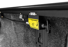 Load image into Gallery viewer, Roll-N-Lock 15-17 Ford F-150 65-5/8in E-Series Retractable Tonneau Cover