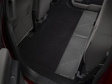 Load image into Gallery viewer, WeatherTech 2015+ Ford F-150 SuperCrew Rear Under Seat Rubber Mats - Black