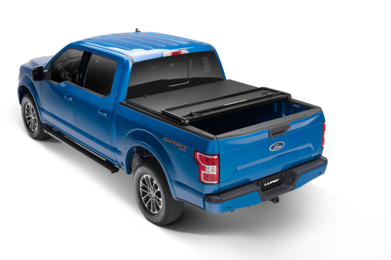 Lund 15-18 Ford F-150 Styleside (6.5ft. Bed) Hard Fold Tonneau Cover - Black