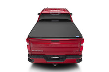 Load image into Gallery viewer, Lund 14-17 Chevy Silverado 1500 (5.5ft. Bed) Genesis Elite Tri-Fold Tonneau Cover - Black